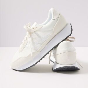 New Balance Women's Sneakers in Cream and White